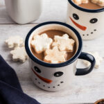 Protein hot chocolate in a mug with marshmallows on top.